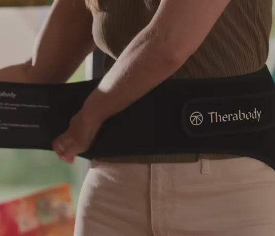 Charger la vidéo : ThermBack LED - Ceinture de massage chauffante dos - Therabody